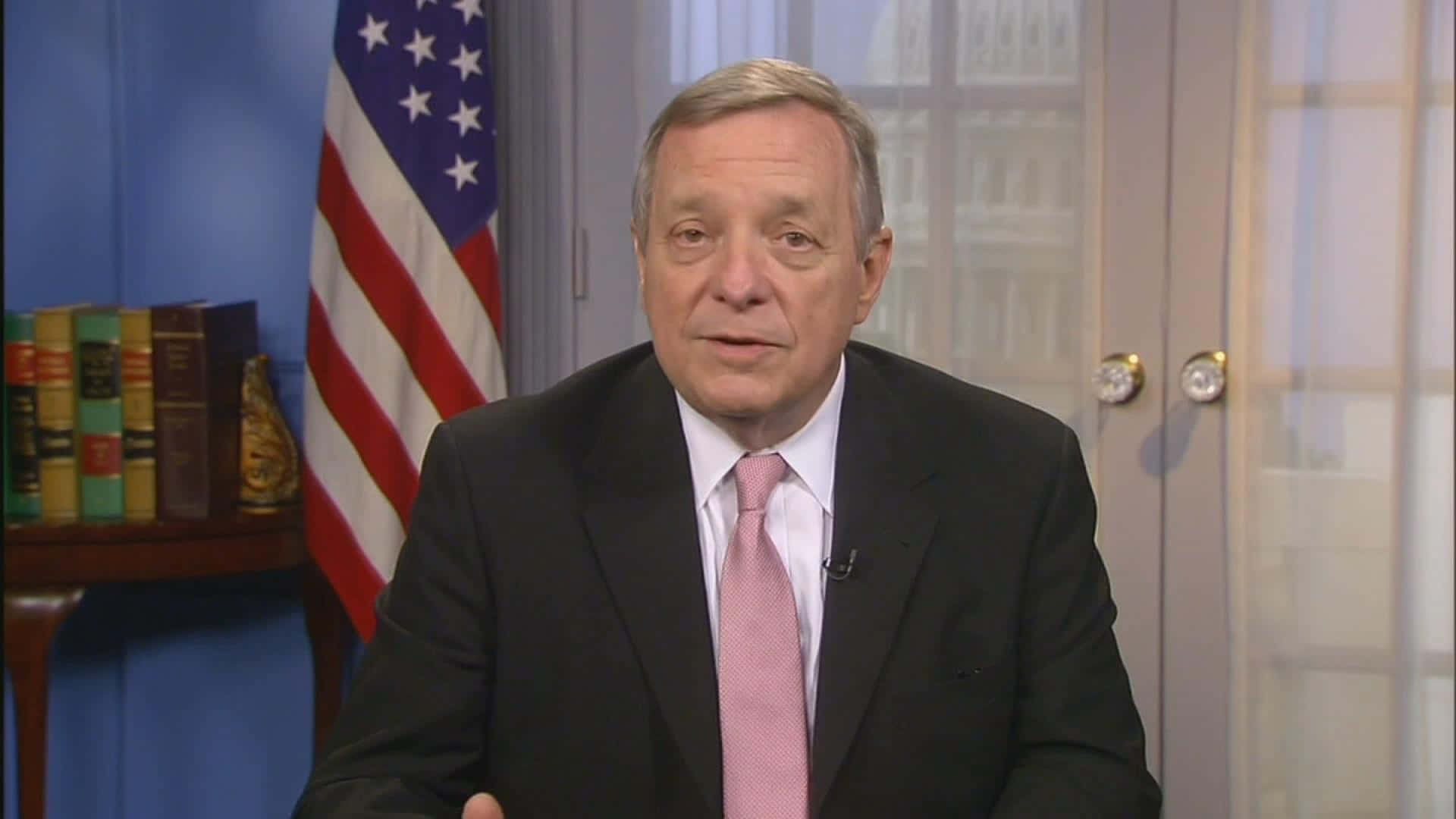 Richard Durbin With Flag In Background Wallpaper