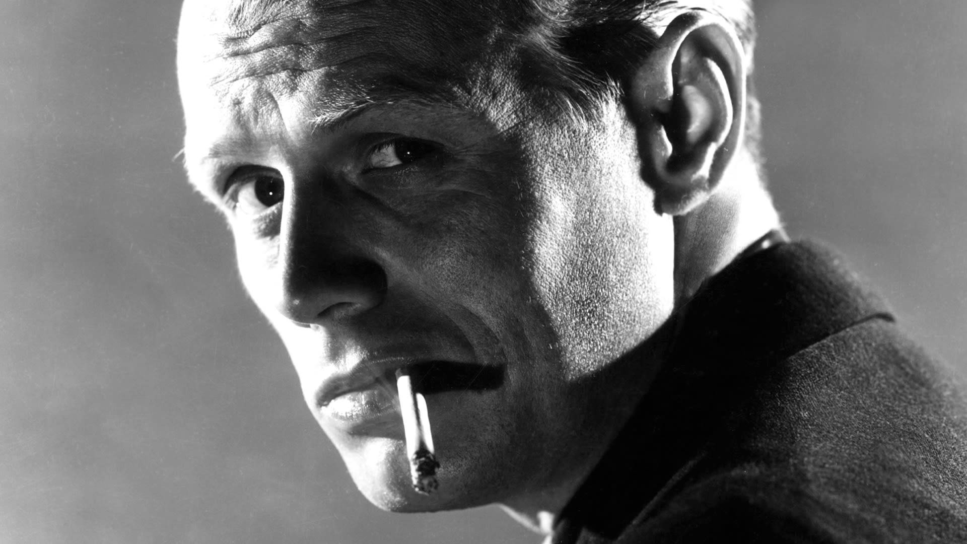 Richardwidmark, Actor Clásico De Hollywood Con Un Cigarrillo. Fondo de pantalla