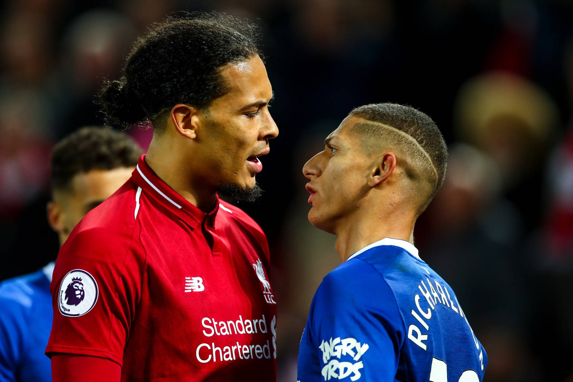 Richarlison De Andrade Confronting An Opponent Wallpaper