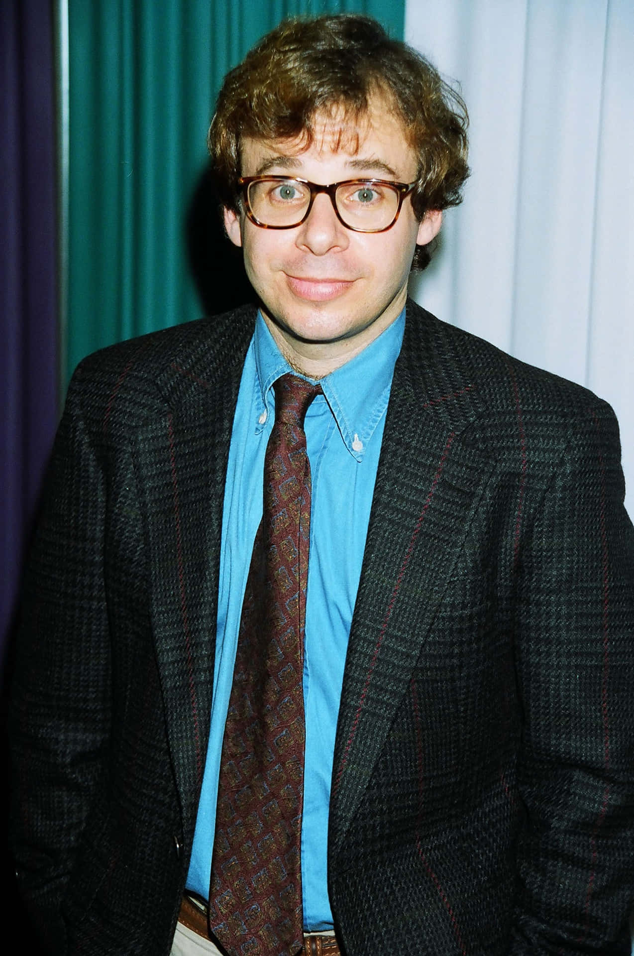 A portrait of Rick Moranis, the popular actor and comedian Wallpaper