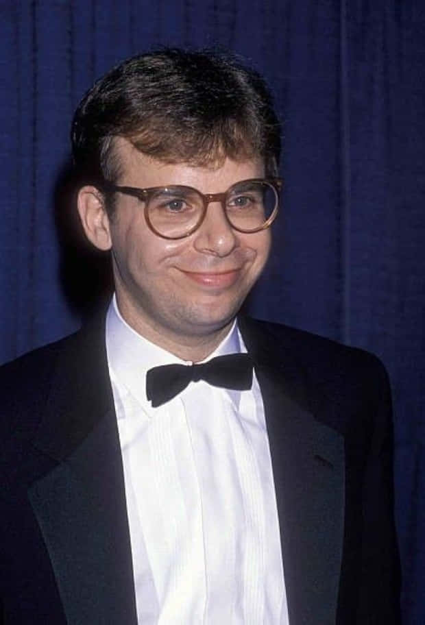 Rick Moranis Famous for his roles in 'Ghostbusters' and 'Honey, I Shrunk the Kids"' Wallpaper