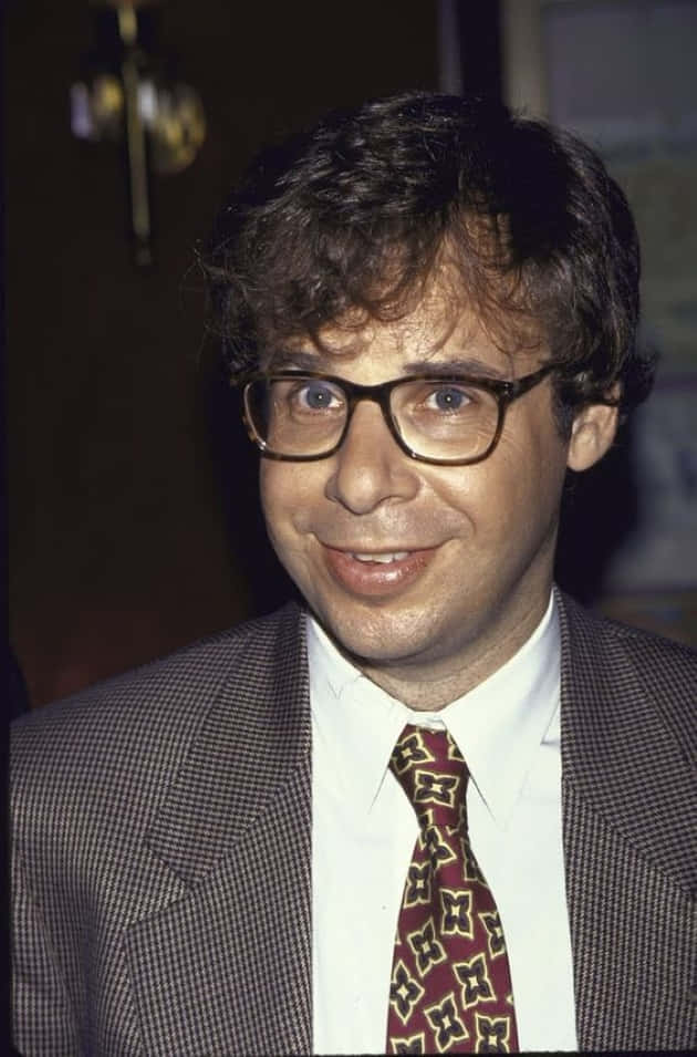 Rick Moranis looking lovable and nerdy in his trademark glasses" Wallpaper