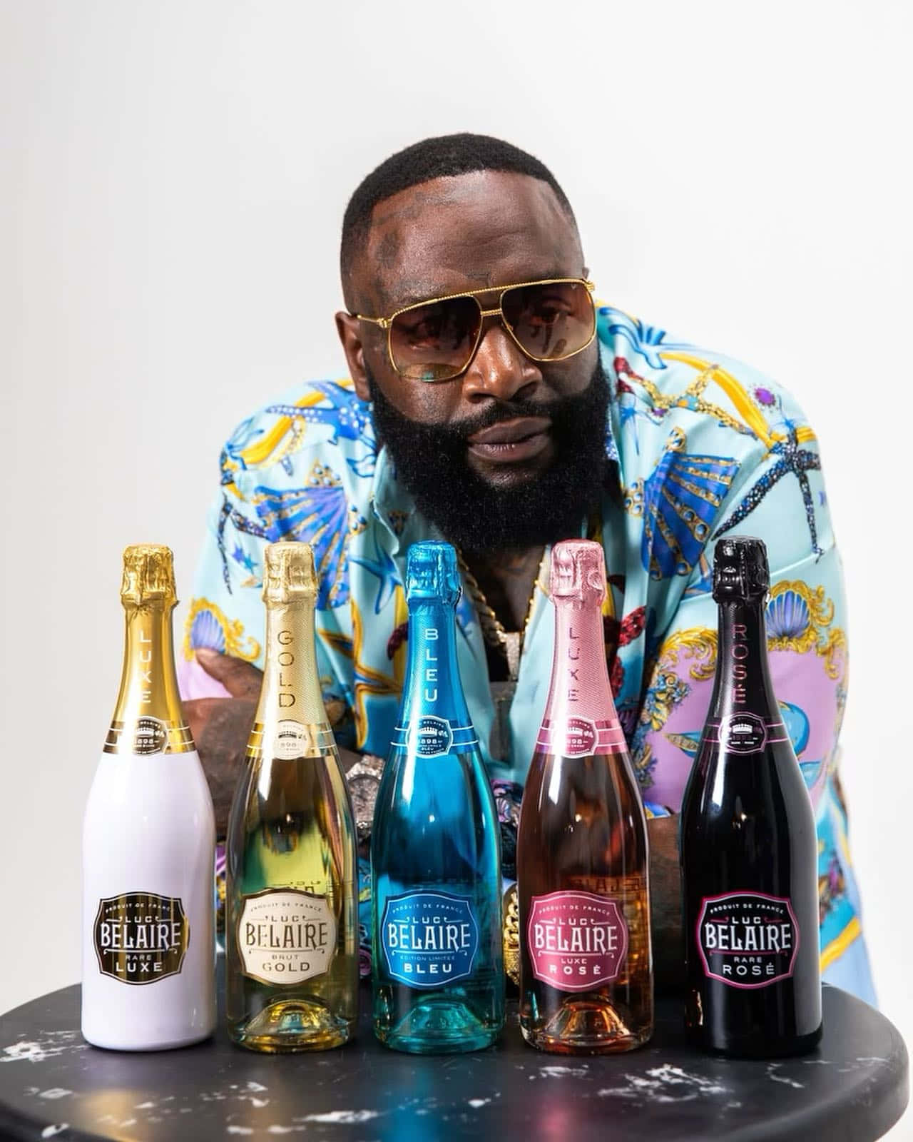 Rick Ross Belaire Champagne Promotion Wallpaper