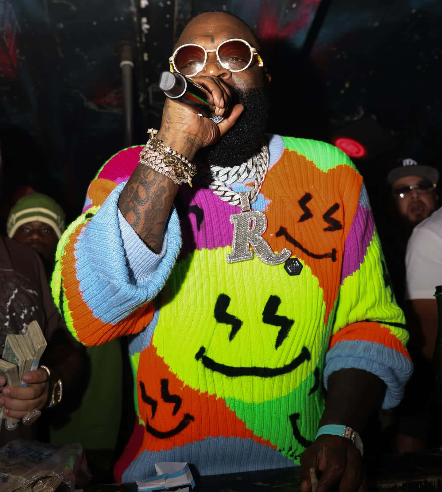 Rick Ross Colorful Performance Wallpaper