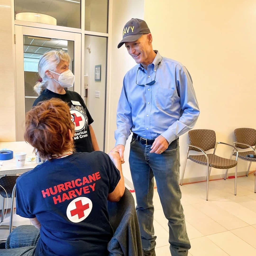 Rickscott Agradece A Los Voluntarios De La Cruz Roja. Fondo de pantalla