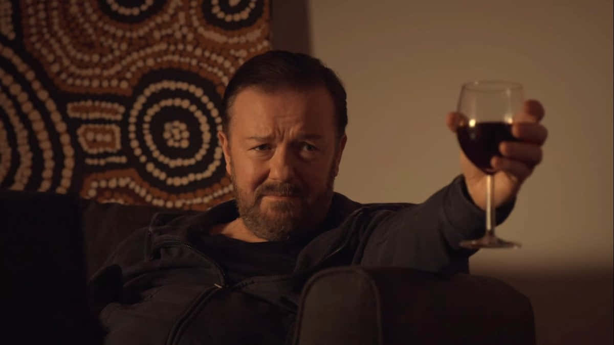 Comedian Ricky Gervais wearing glasses Wallpaper