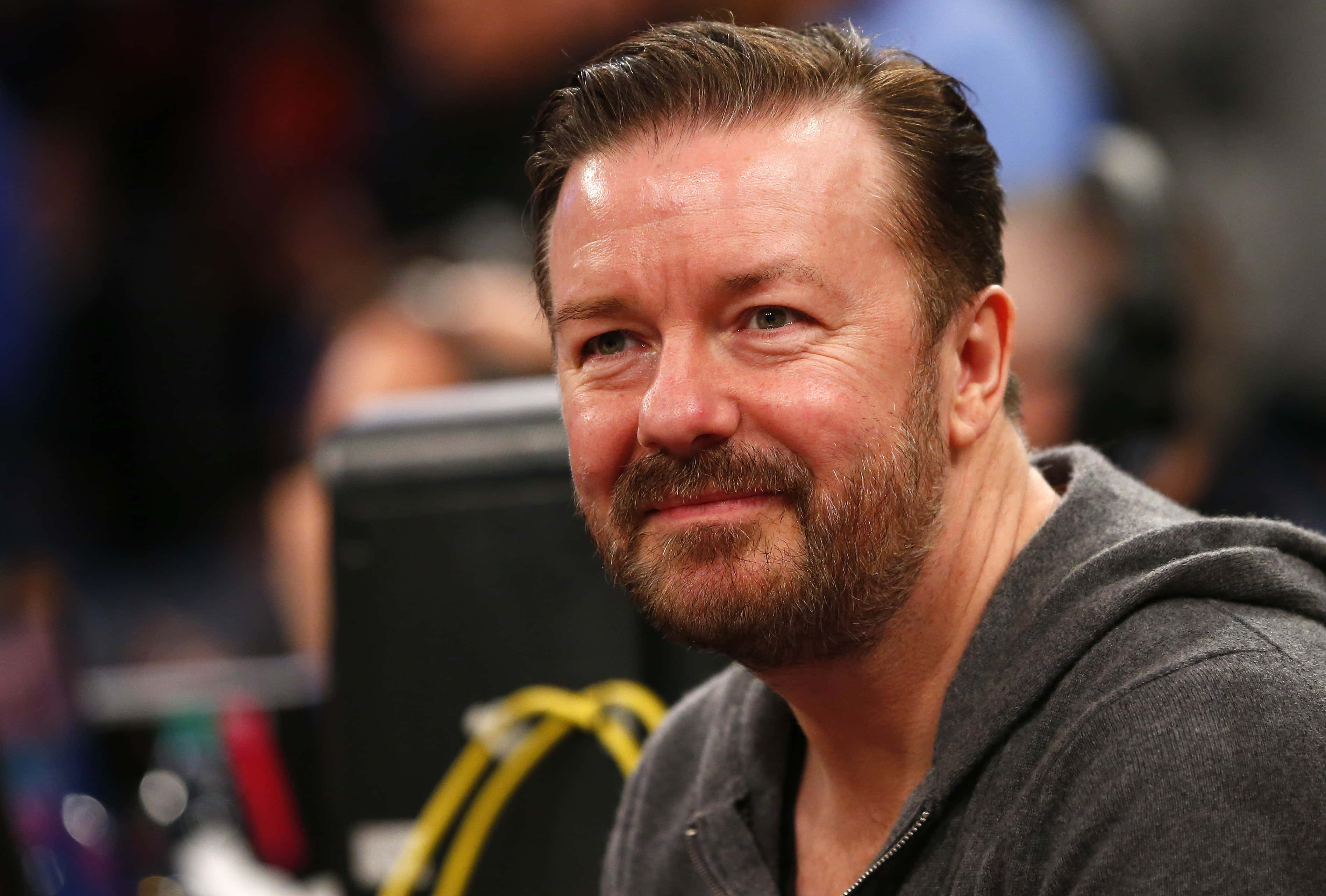 Ricky Gervais making an iconic facial expression Wallpaper