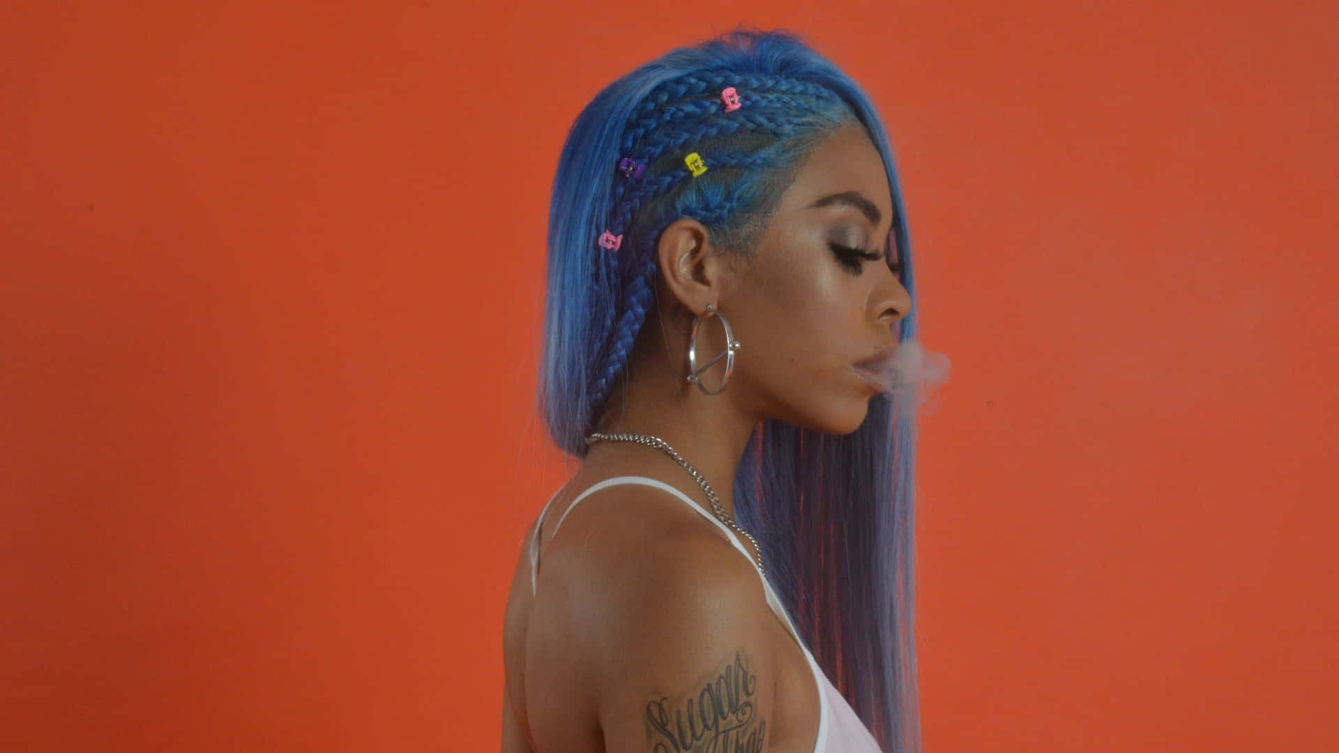 Americanrapper Rico Nasty Is Known For Her Unique Style And Energetic Performances. Her Music Often Incorporates Elements Of Hip-hop, Trap, And Punk Rock. With Her Bold And Colorful Personality, Rico Nasty Has Gained A Dedicated Fan Base And Is Constantly Pushing Boundaries In The Music Industry. Fondo de pantalla