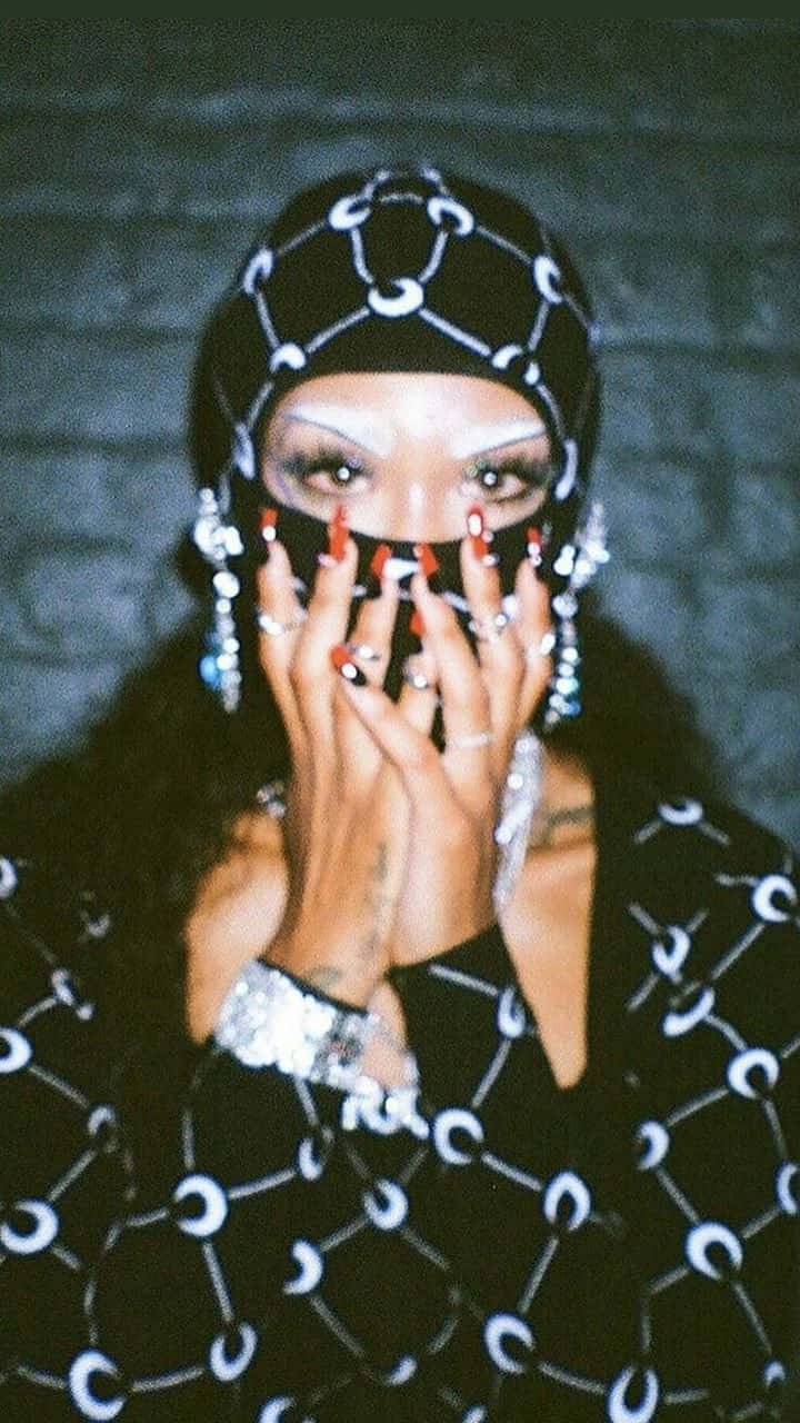 Rico Nasty in her signature style, embracing her individuality. Wallpaper