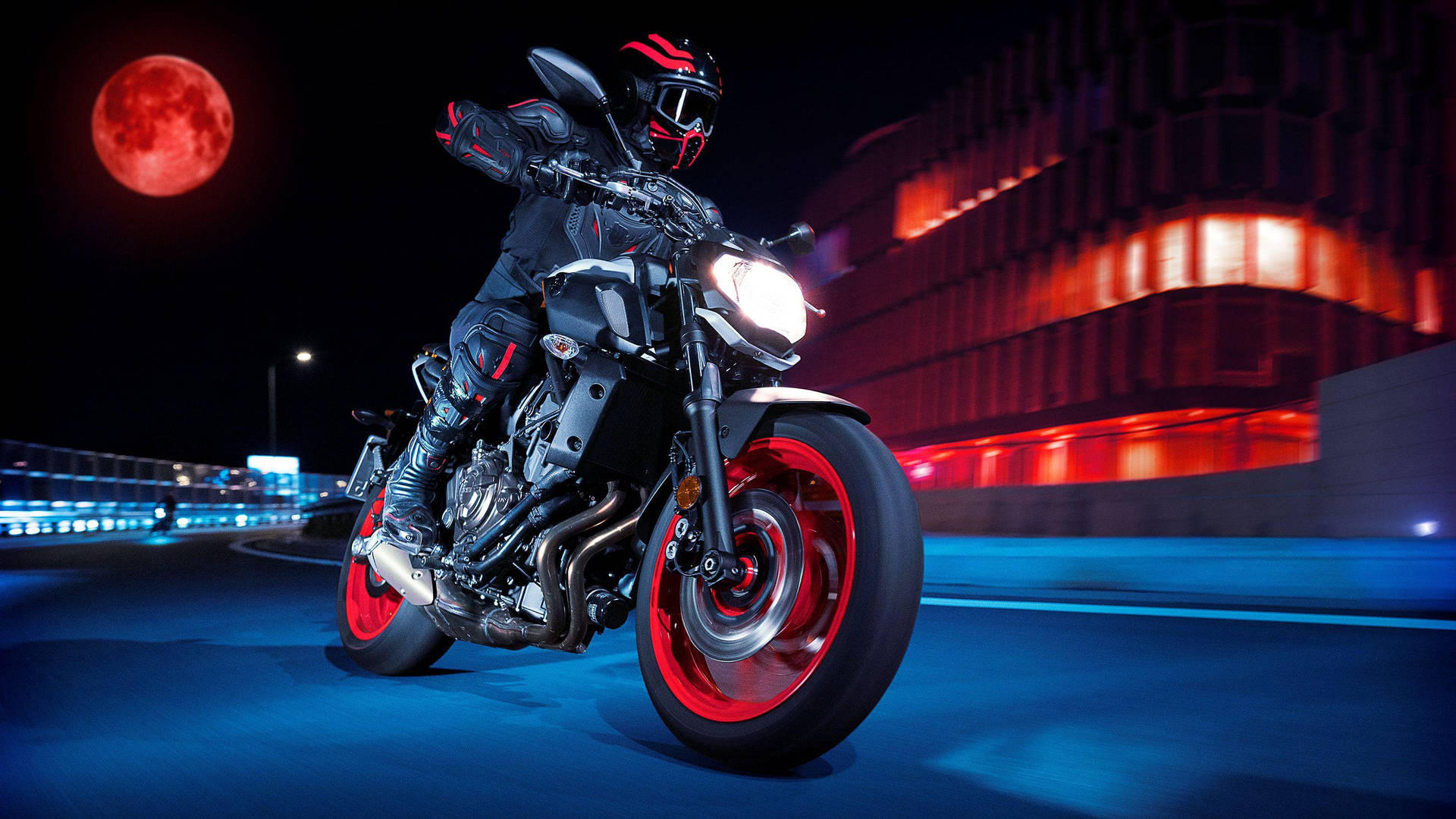 Rider With Black Yamaha MT 15 Under The Red Moon Wallpaper