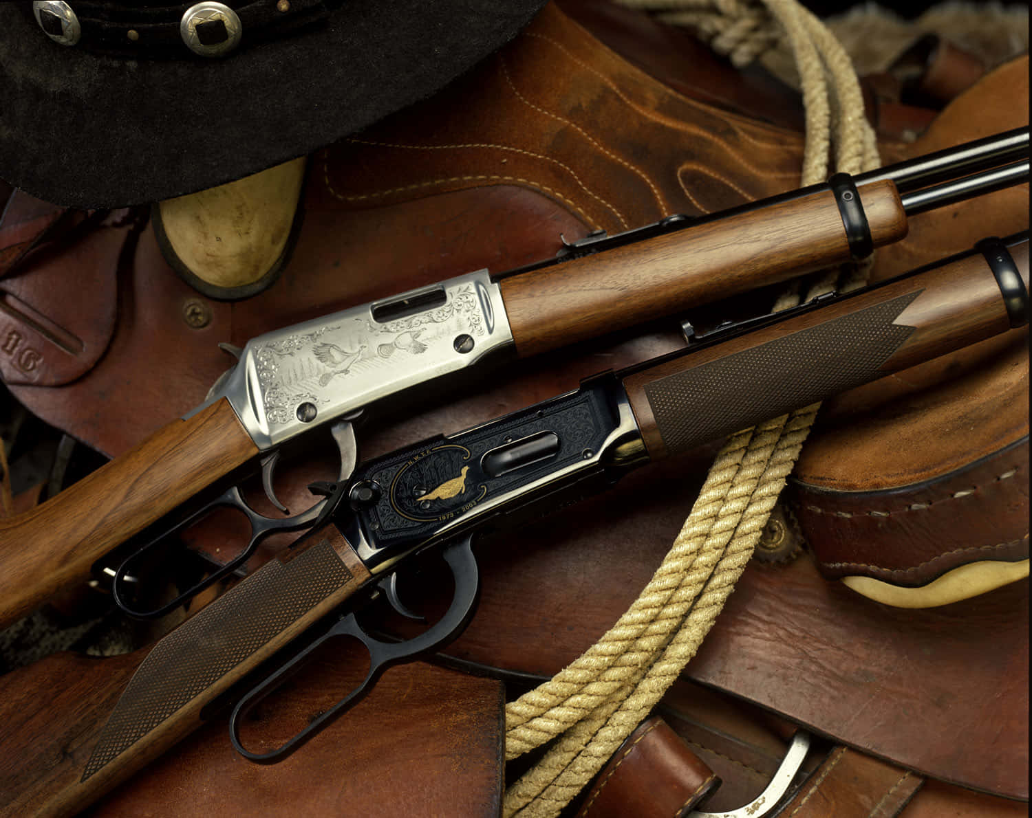 Two Rifles And A Cowboy Hat