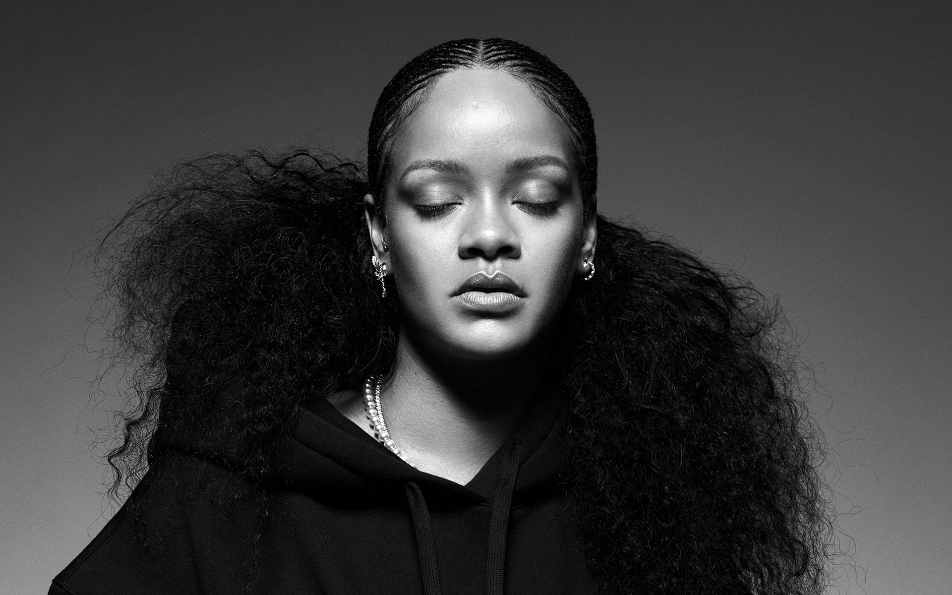 Rihanna admired in black and white. Wallpaper