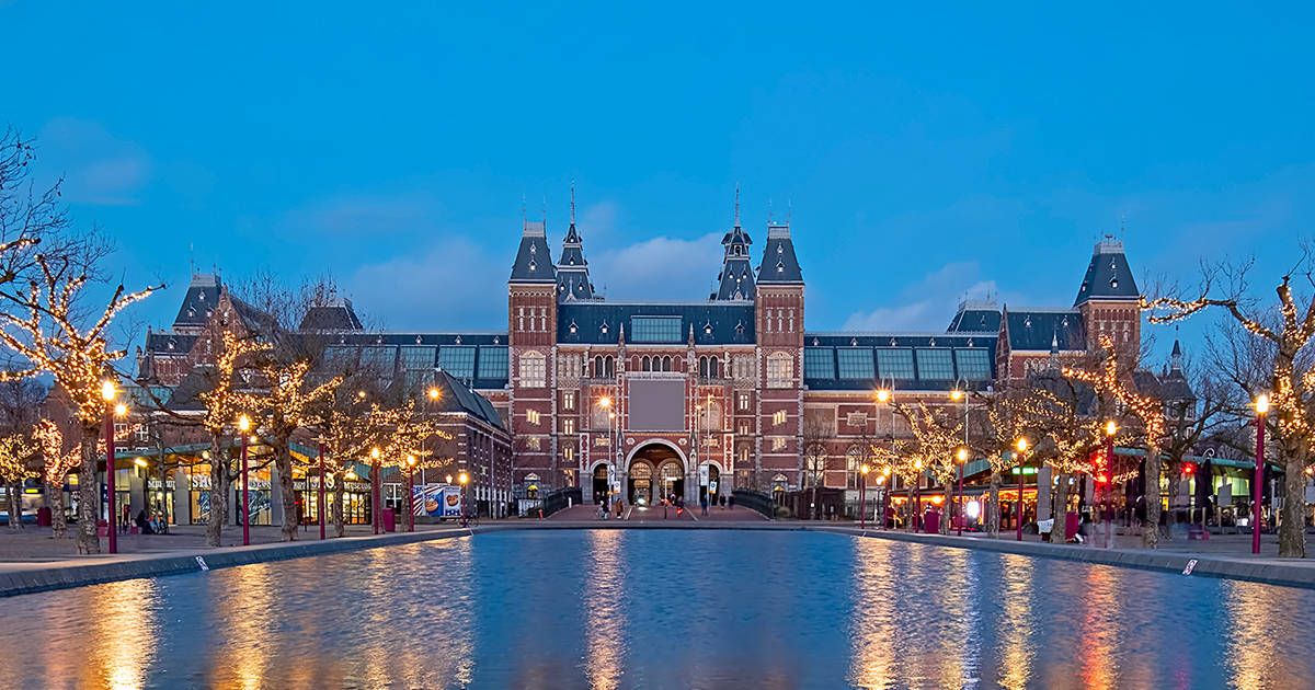 Rijksmuseum With Christmas Lights At Night Background