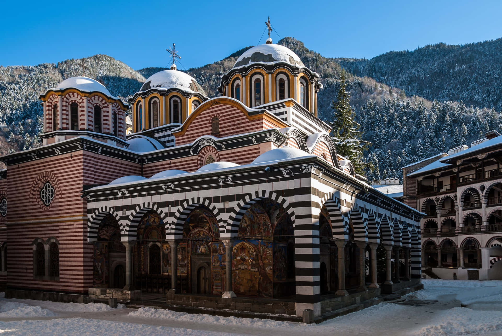 Majestic View of Rila Monastery Amidst the Bulgarian Mountains Wallpaper