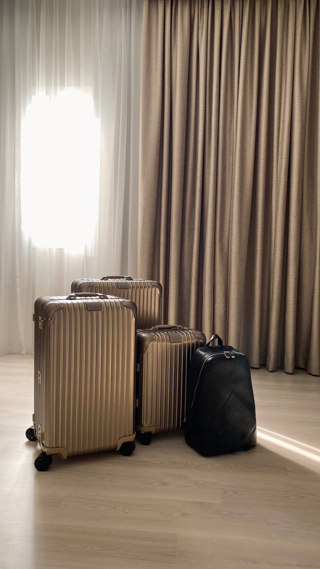 Rimowa Suitcases In Bright Room Wallpaper