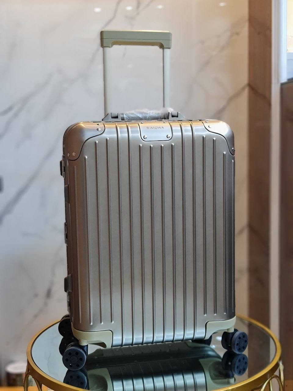 Rimowa Topaz Cabin Suitcase Wallpaper