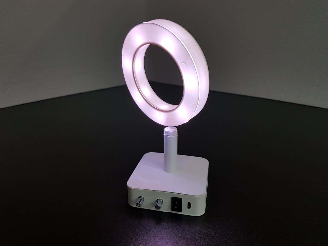 A Small Led Light On A Table
