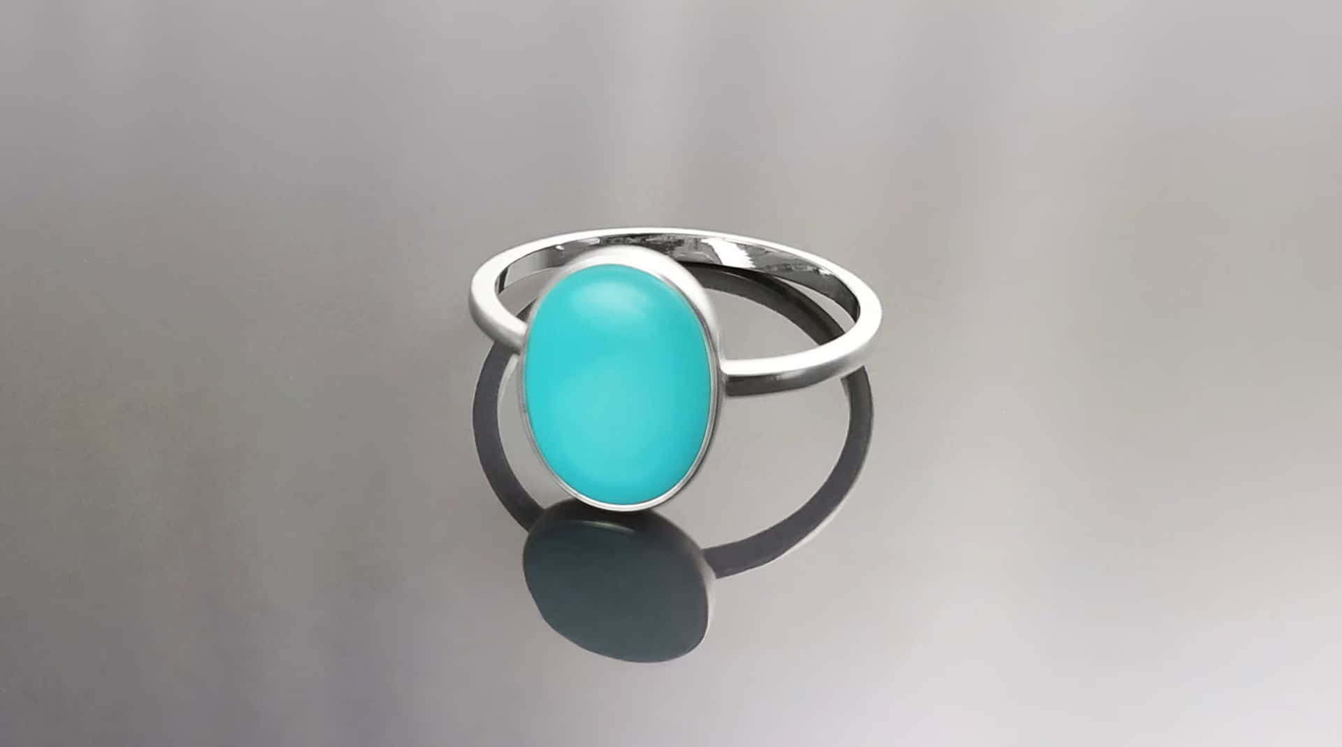 Ring With Bright Blue Oval Stone Wallpaper