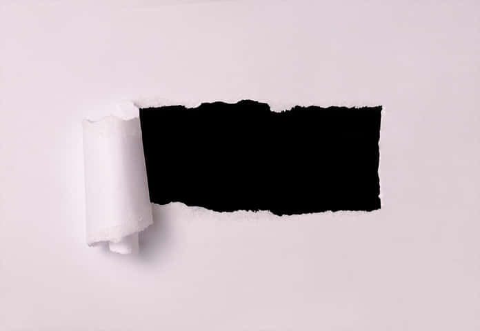 Ripped Paper Revealing Black Background.jpg PNG