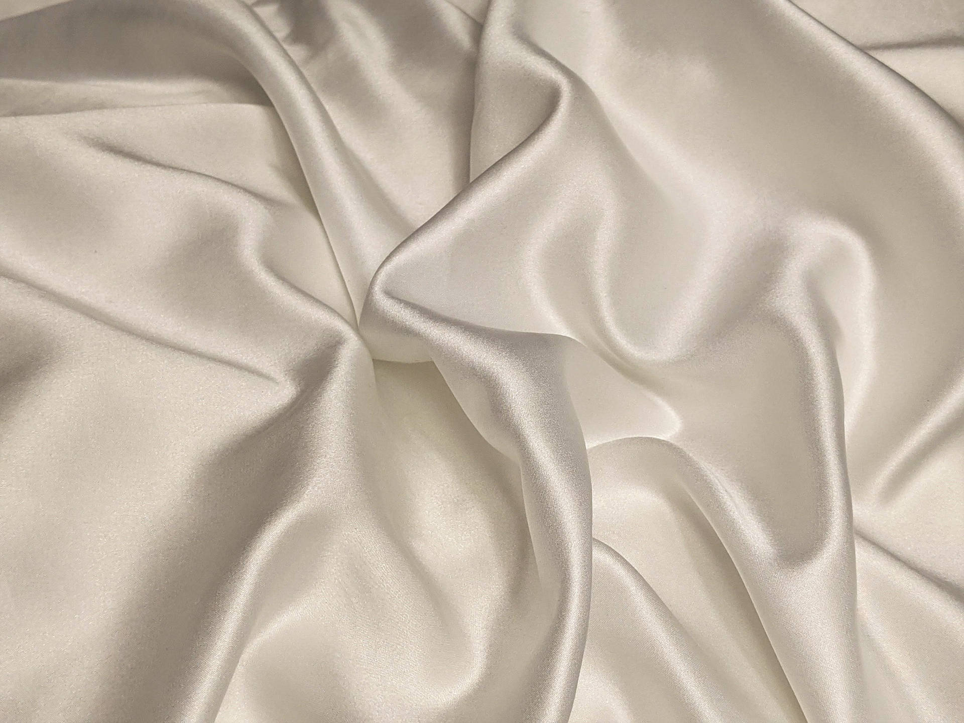 Rippled White Silk Fabric Background