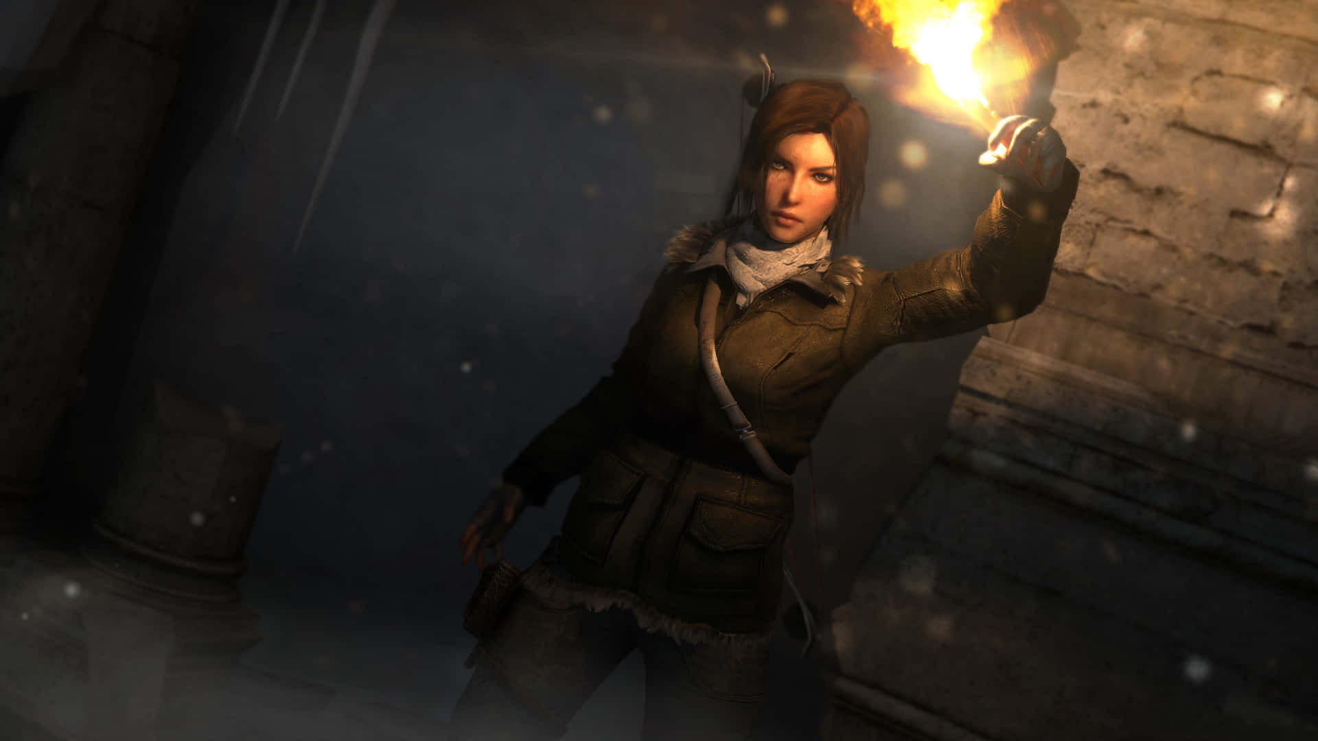 A Woman Holding A Torch In Front Of A Building