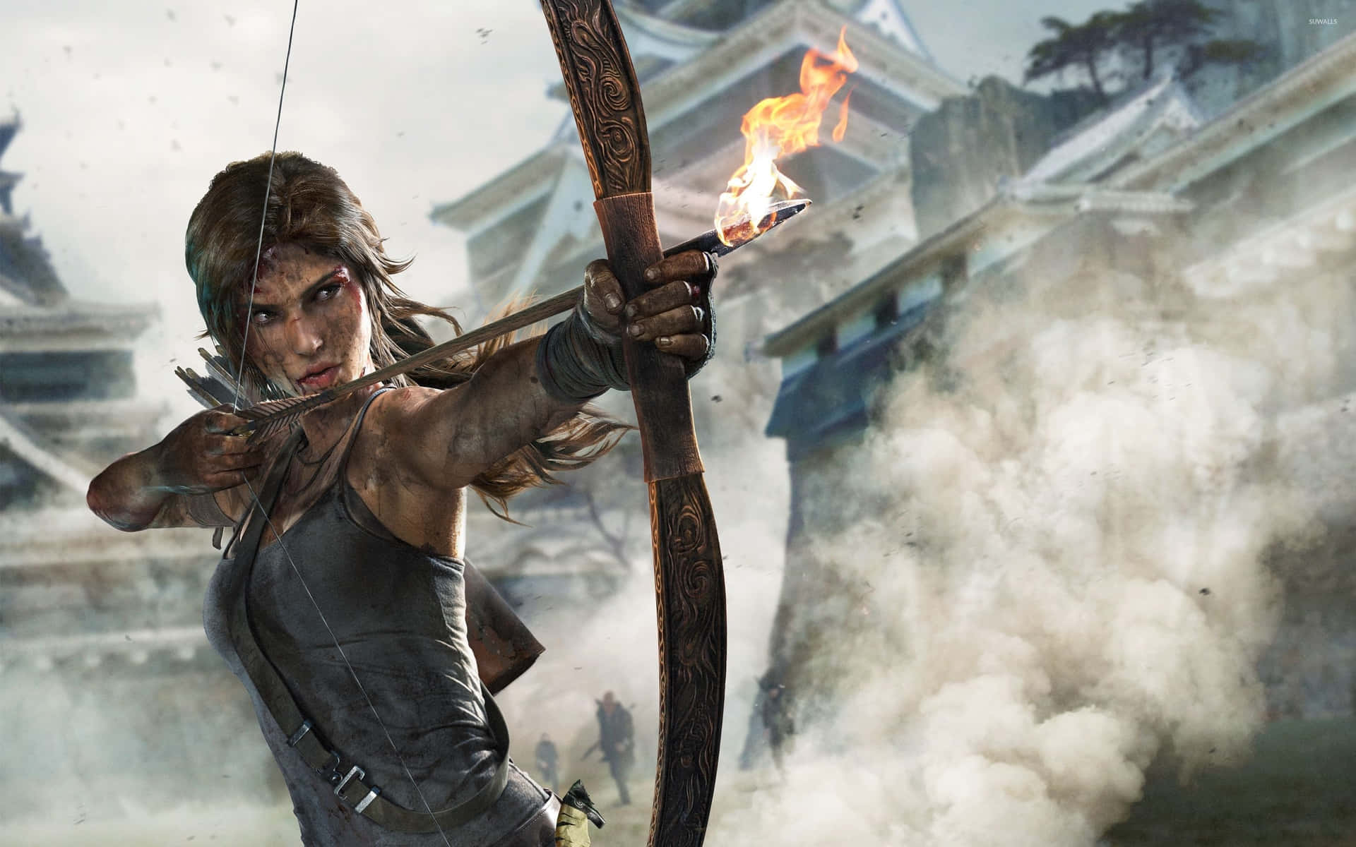 The Tomb Raider Is Aiming Her Bow At A Castle Wallpaper