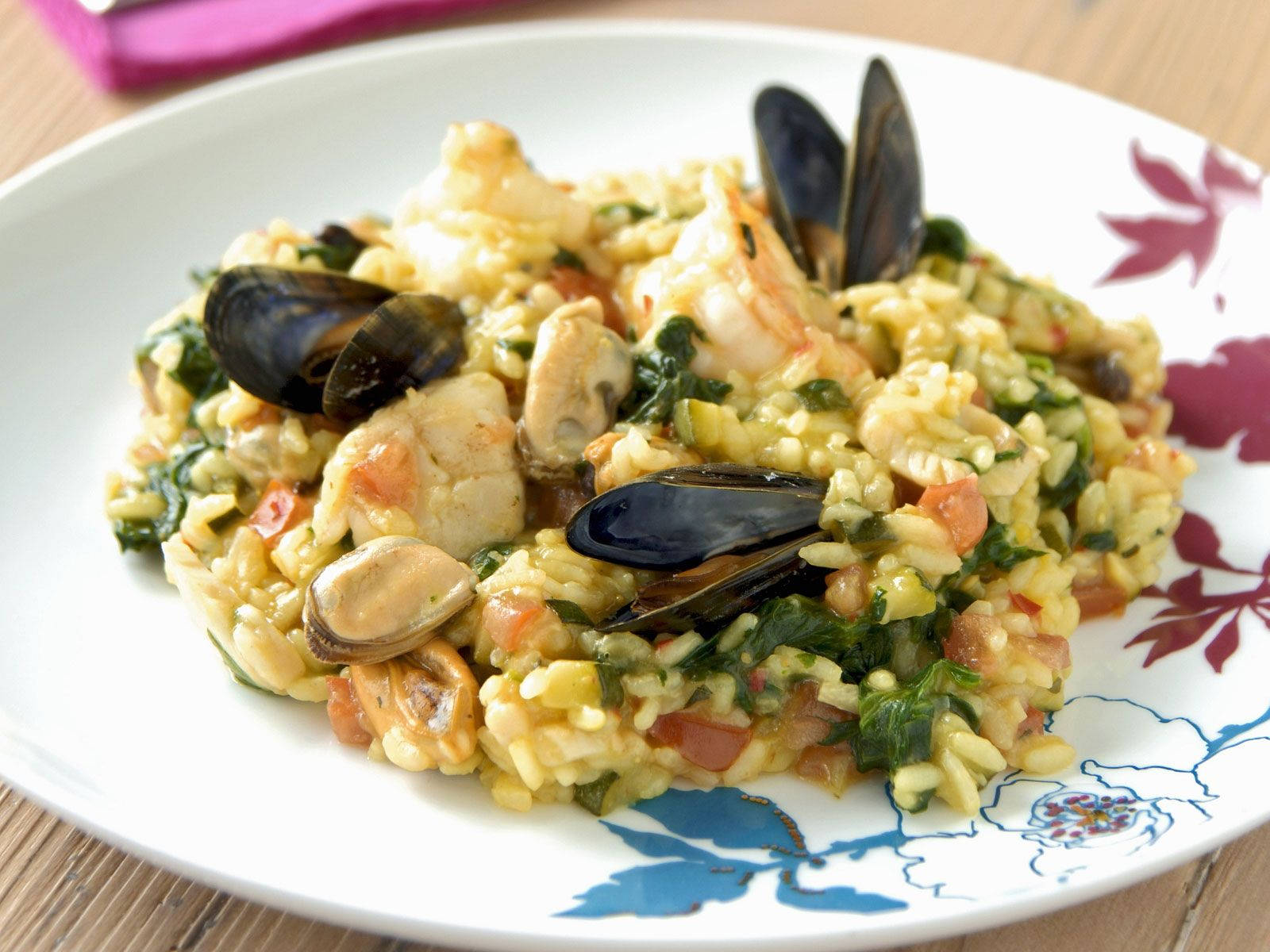 A flavorful and delectable plate of Seafood Risotto Wallpaper
