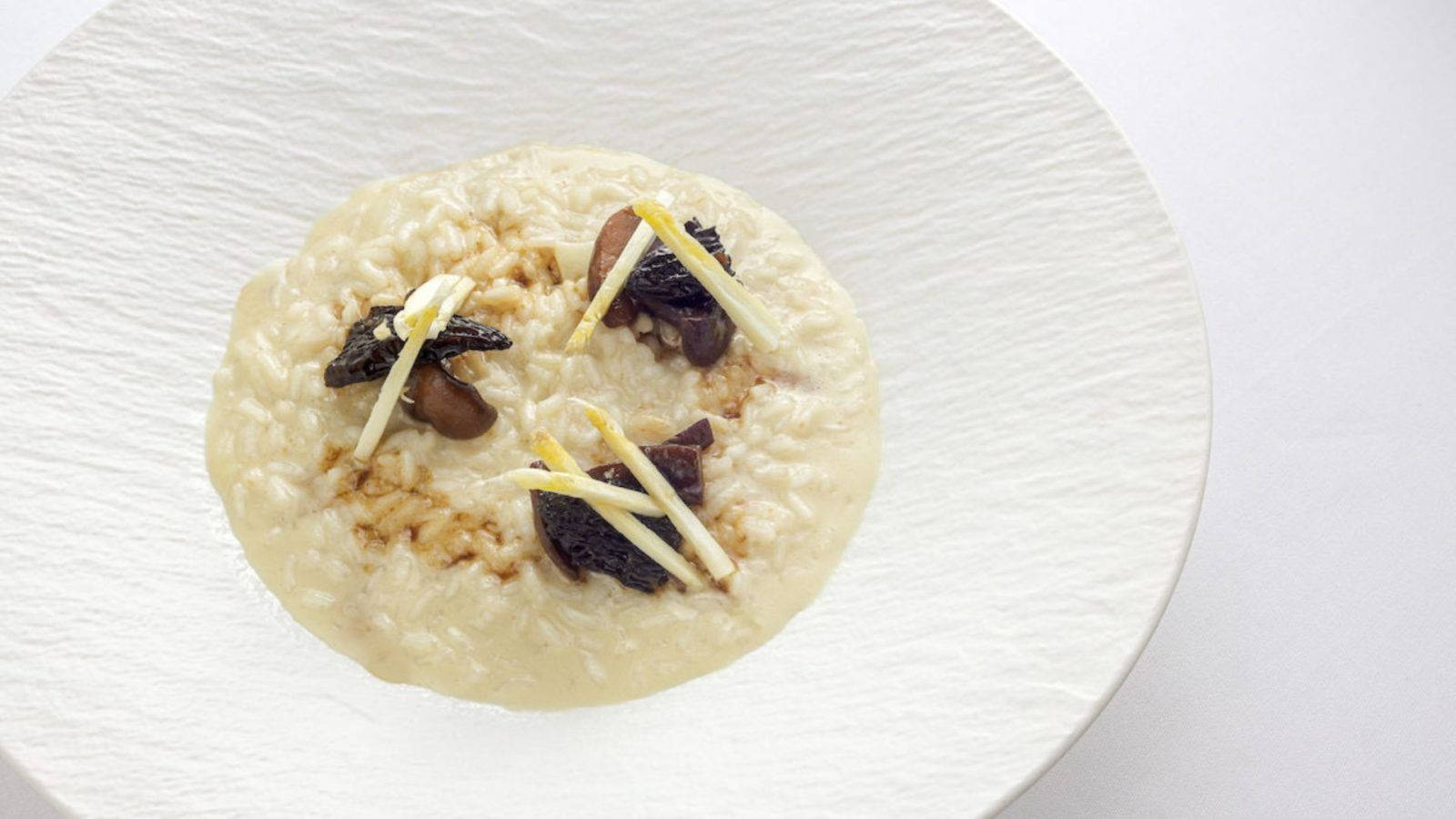 "Savory White Asparagus Risotto served hot and fresh" Wallpaper