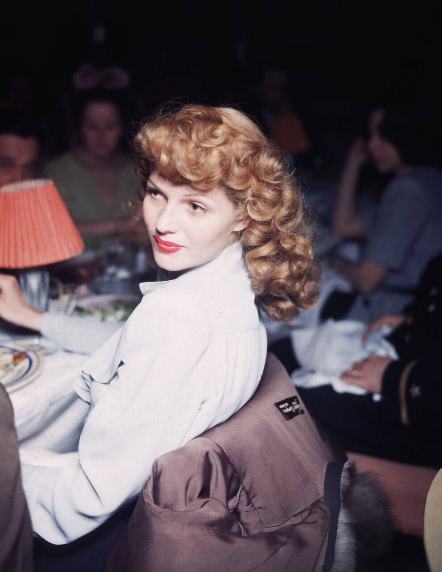 Rita Hayworth At Dinner Table Wallpaper