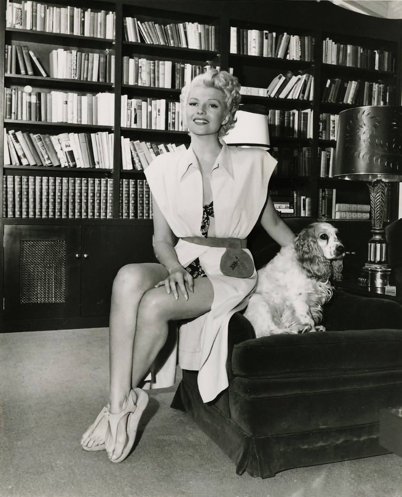 Rita Hayworth Beside A Dog Wallpaper