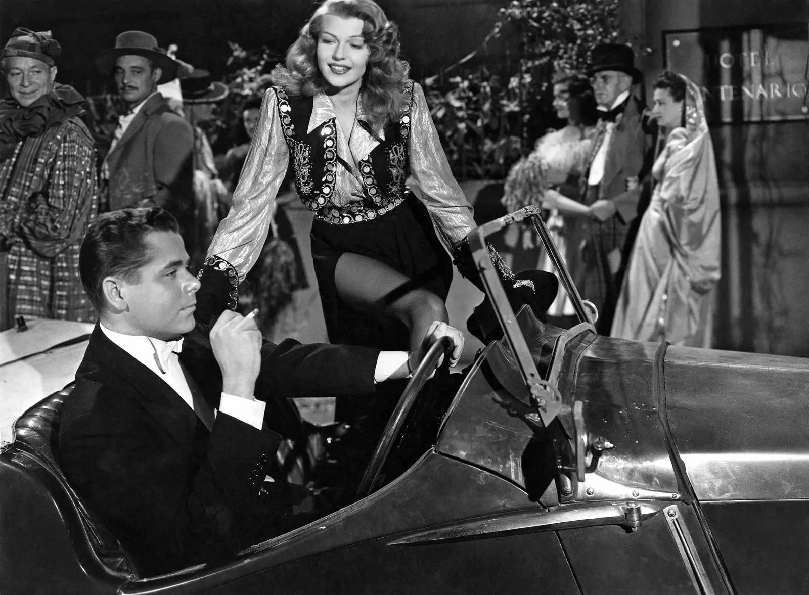 Rita Hayworth Konvertibel Bil Kommer til Liv på Din Skærm. Wallpaper