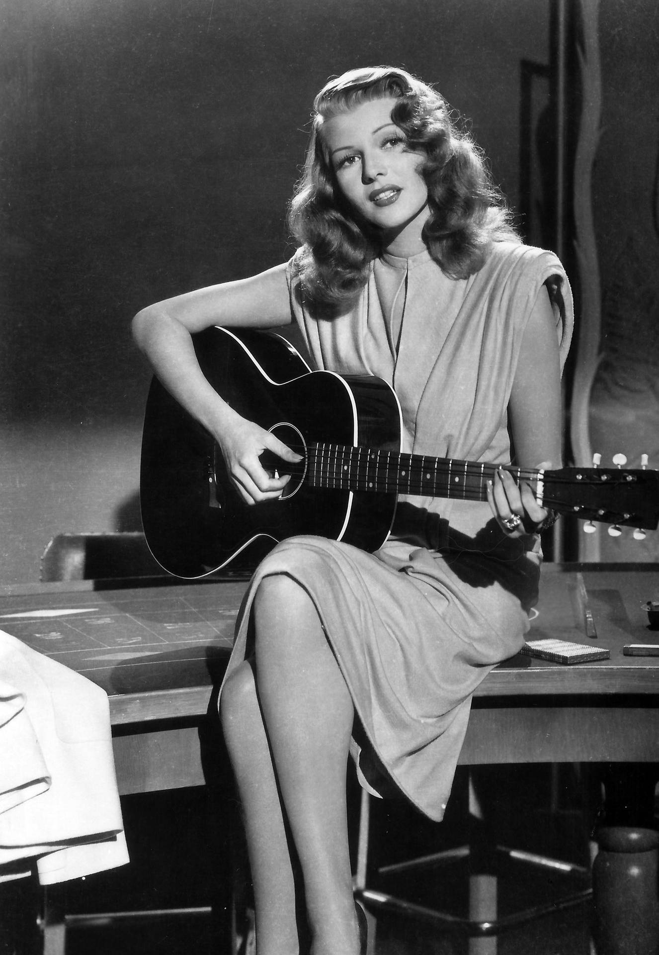 Rita Hayworth Playing Guitar Wallpaper