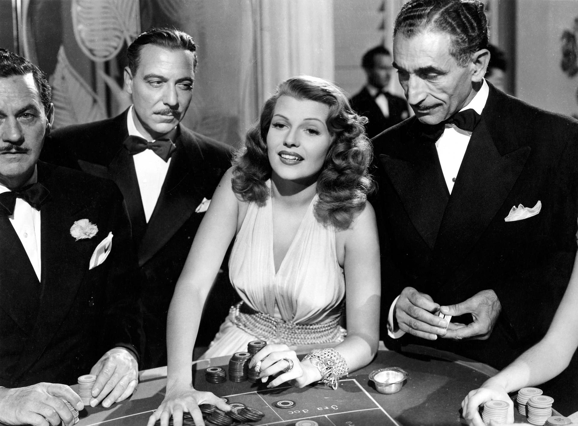 Tapet af Rita Hayworth, der spiller roulette til din computer. Wallpaper