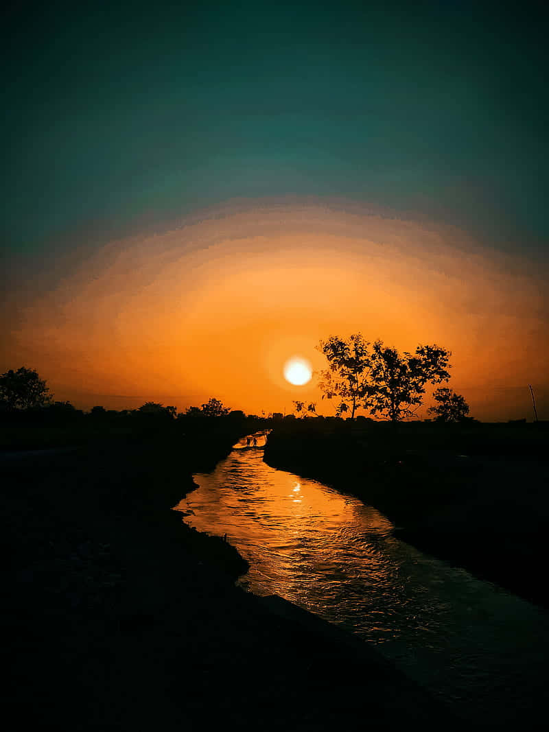 River Under Evening Sky Wallpaper