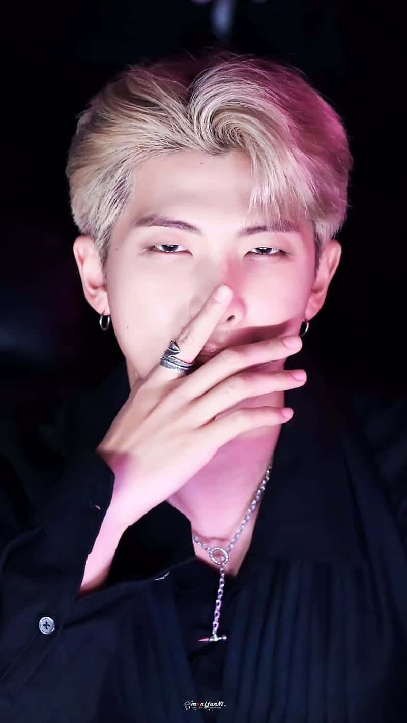 RM, the leader of BTS, displaying his passion for music