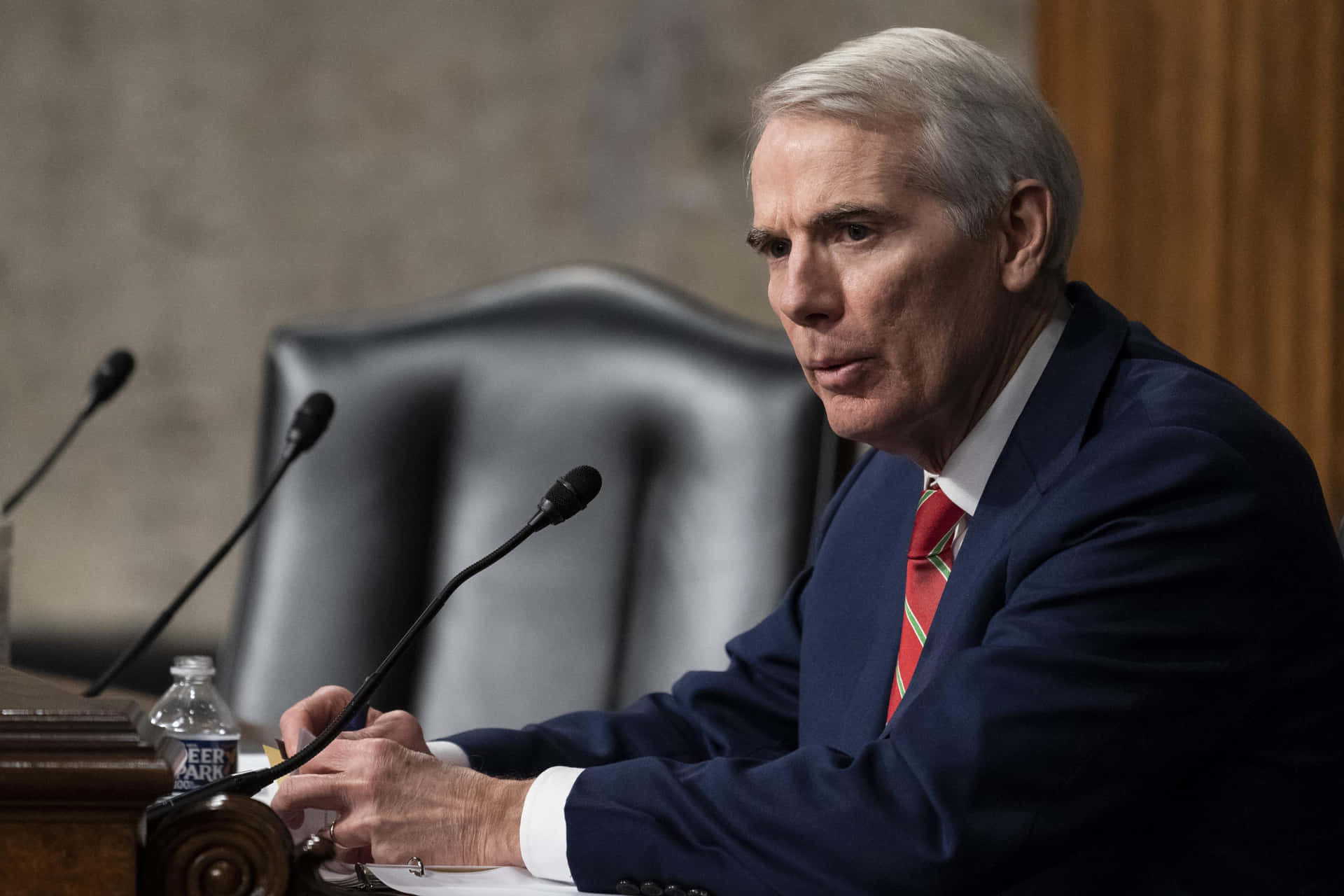 Rob Portman Leaning On Conference Table Wallpaper