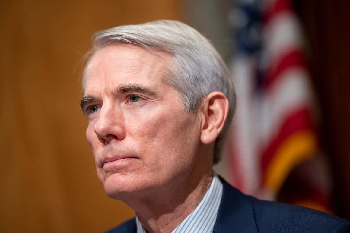 "Profile of Rob Portman in a Serious Discussion" Wallpaper
