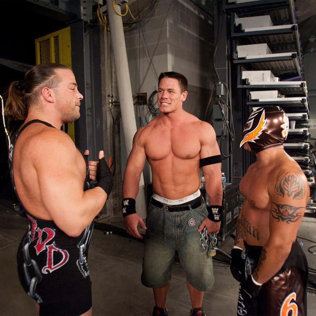 Rob Van Dam med John Cena og Rey Mysterio Wallpaper
