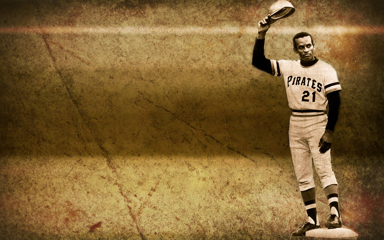 Roberto Clemente Vintage Poster Tapet: Få nostalgifølelsen med dette rene og klassiske tapet af Pittsburgh Pirates legenden Roberto Clemente. Wallpaper