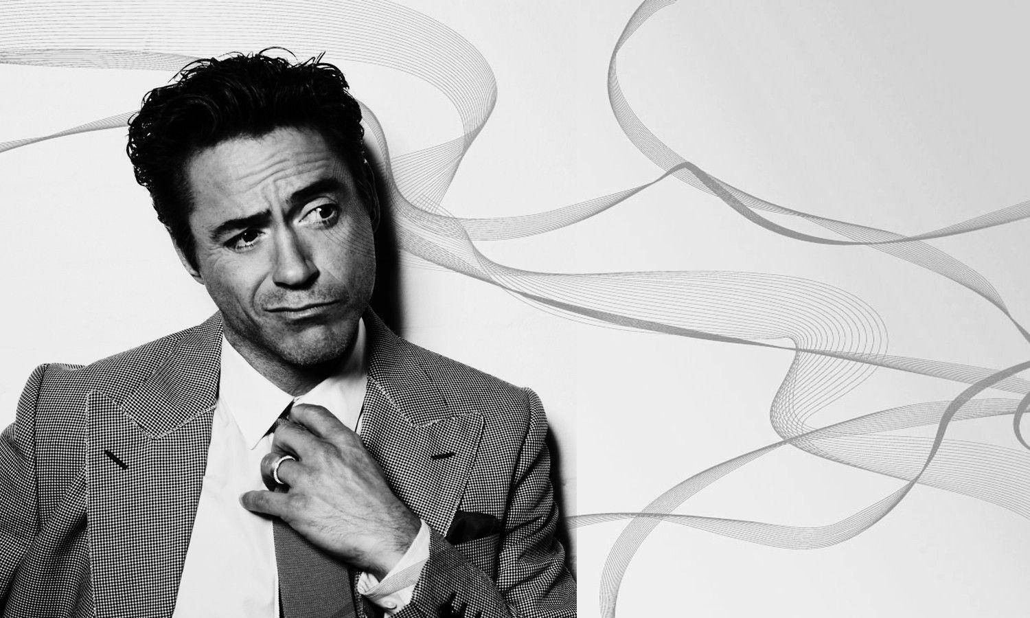 Robert Downey Jr looking dapper in a suit and tie Wallpaper