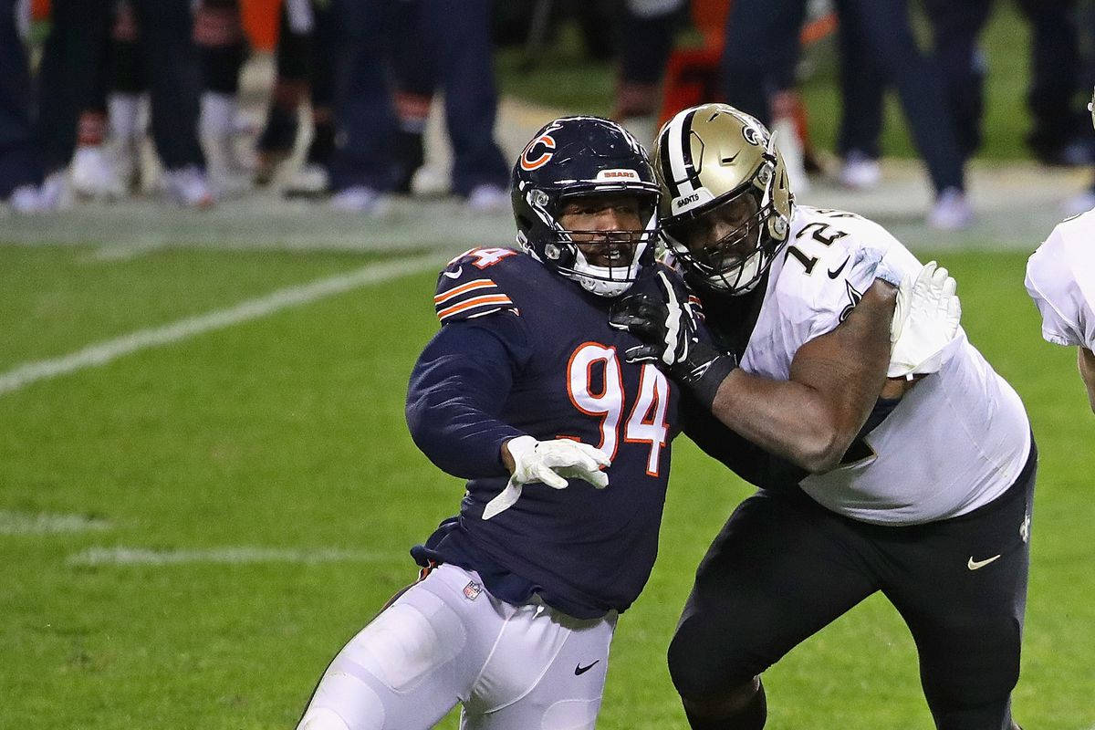 Robert Quinn Tackled By Opponent