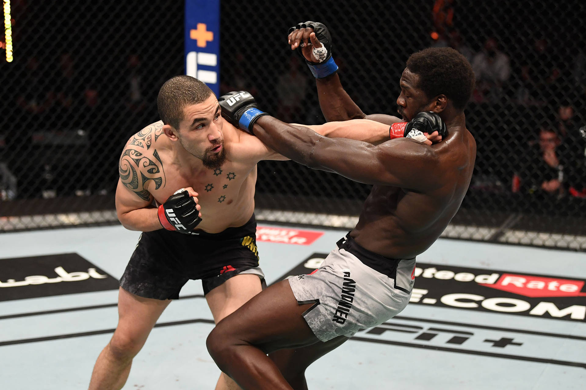 Robert Whittaker And Jared Cannonier Fight Wallpaper