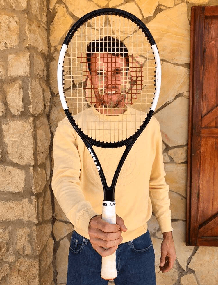 Roberto Bautista Agut Behind Tennis Racket Wallpaper