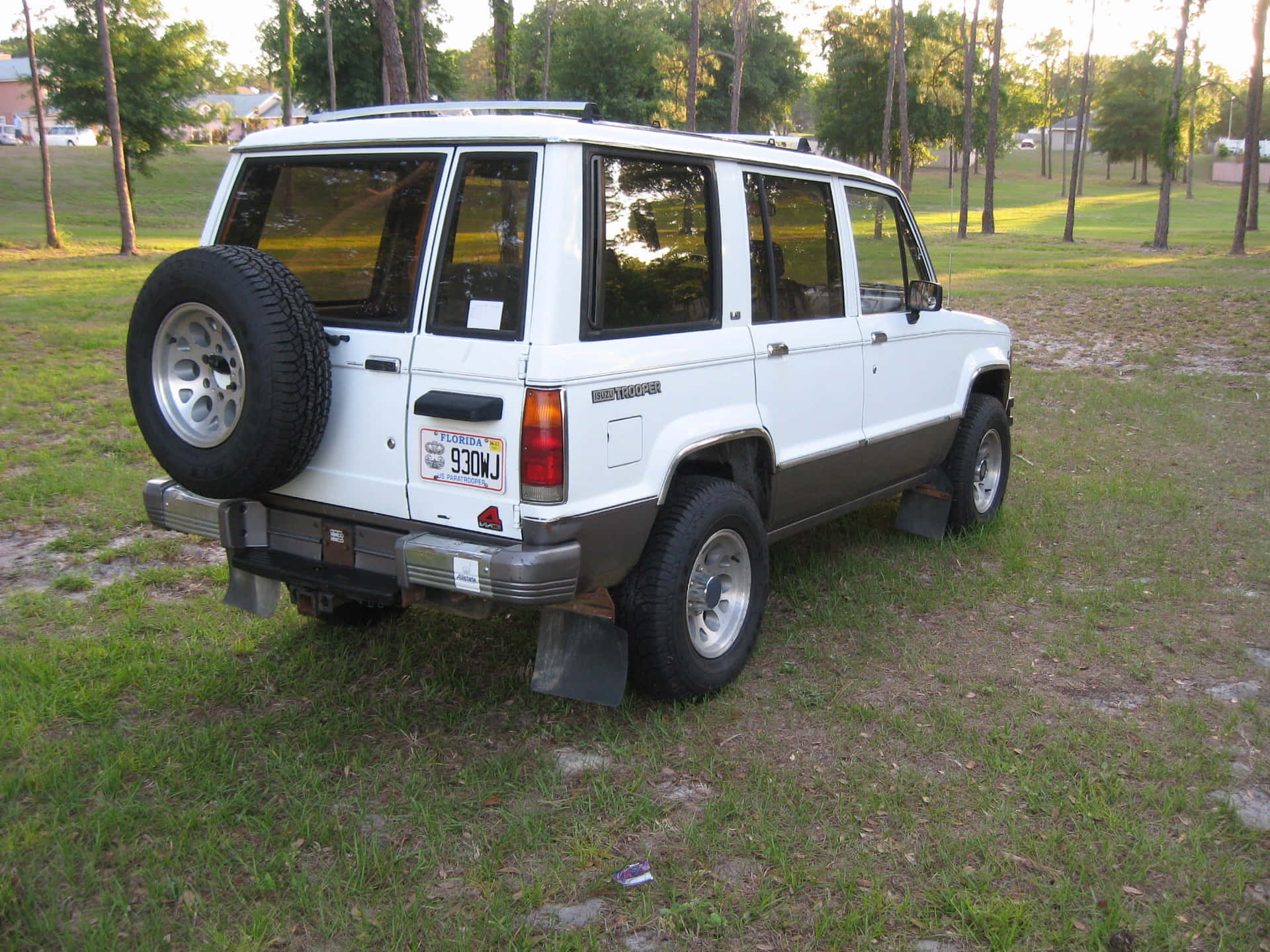 Robust And Refined Isuzu Trooper In Majestic Wilderness Wallpaper