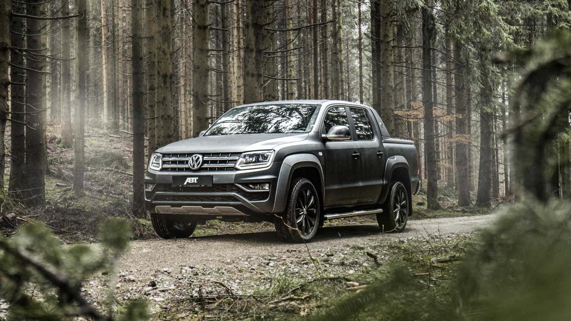 Robust Volkswagen Amarok Powerfully Tackling Outdoor Terrains Wallpaper