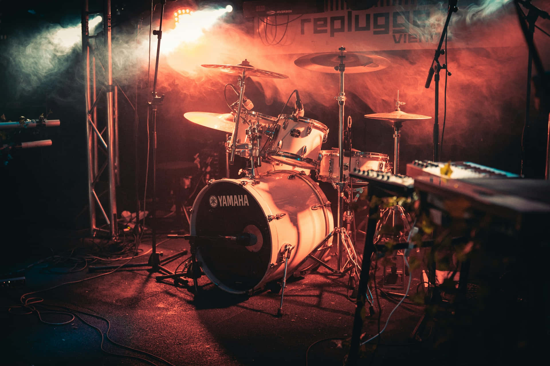 Rock Concert Drum Set Backlit Stage Wallpaper