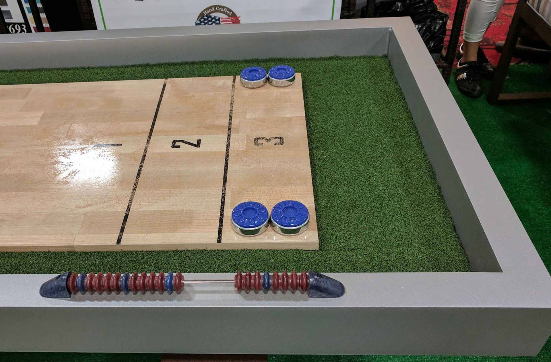 Competitive Fun with Rock-Solid Outdoor Shuffleboard Table Wallpaper