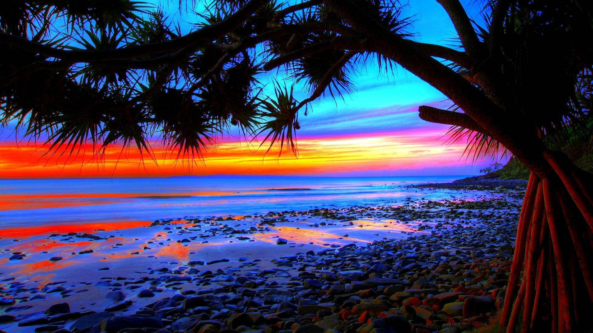 Rocky Beach During Sunset Wallpaper