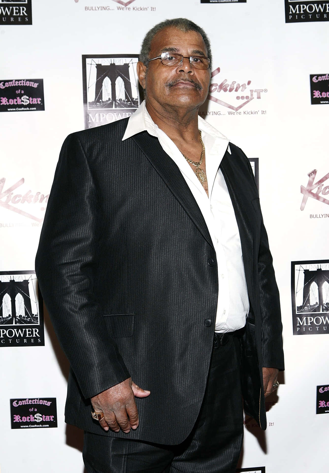 Rocky Johnson Attends A Charity Event Wallpaper