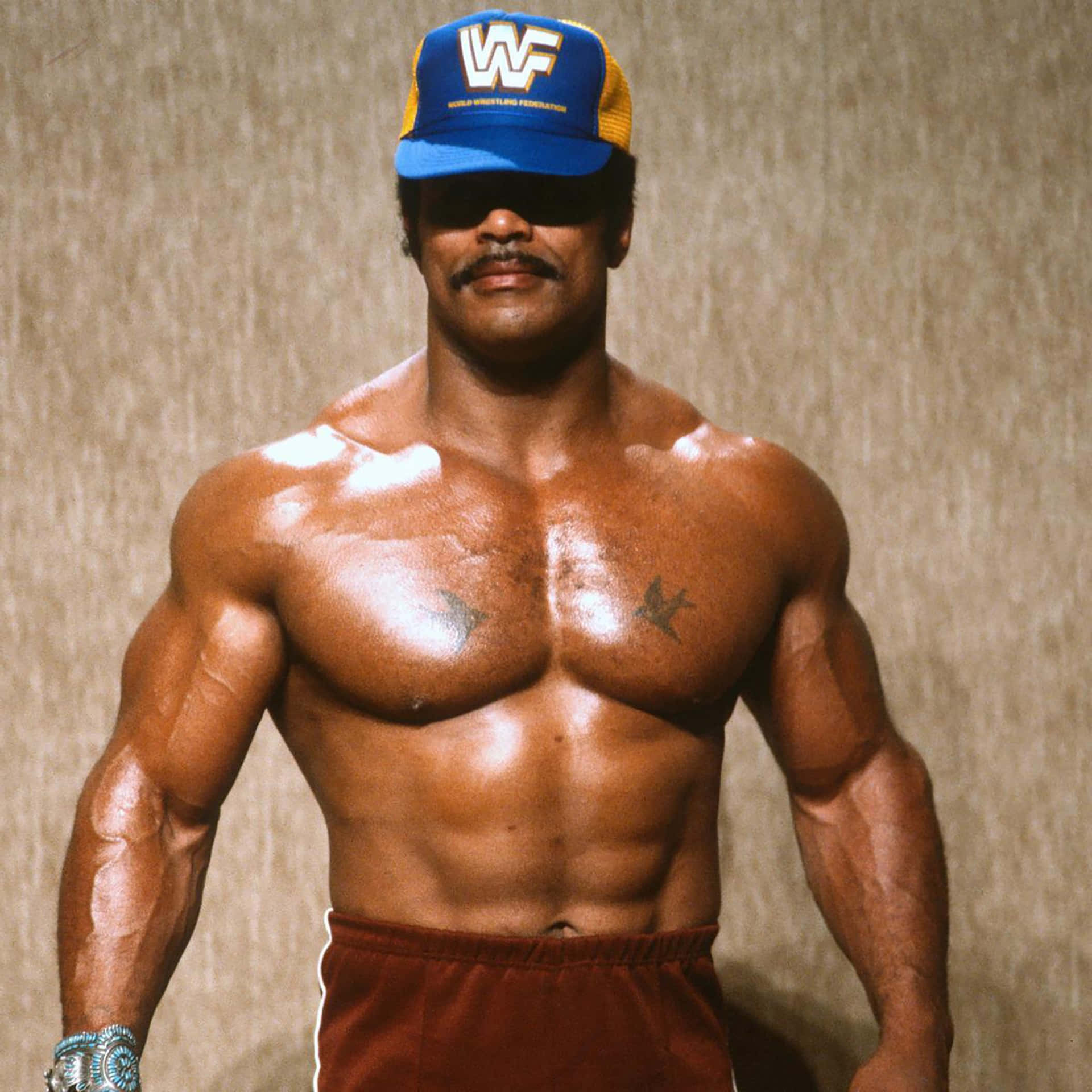 Rocky Johnson Wearing WWF Cap Wallpaper